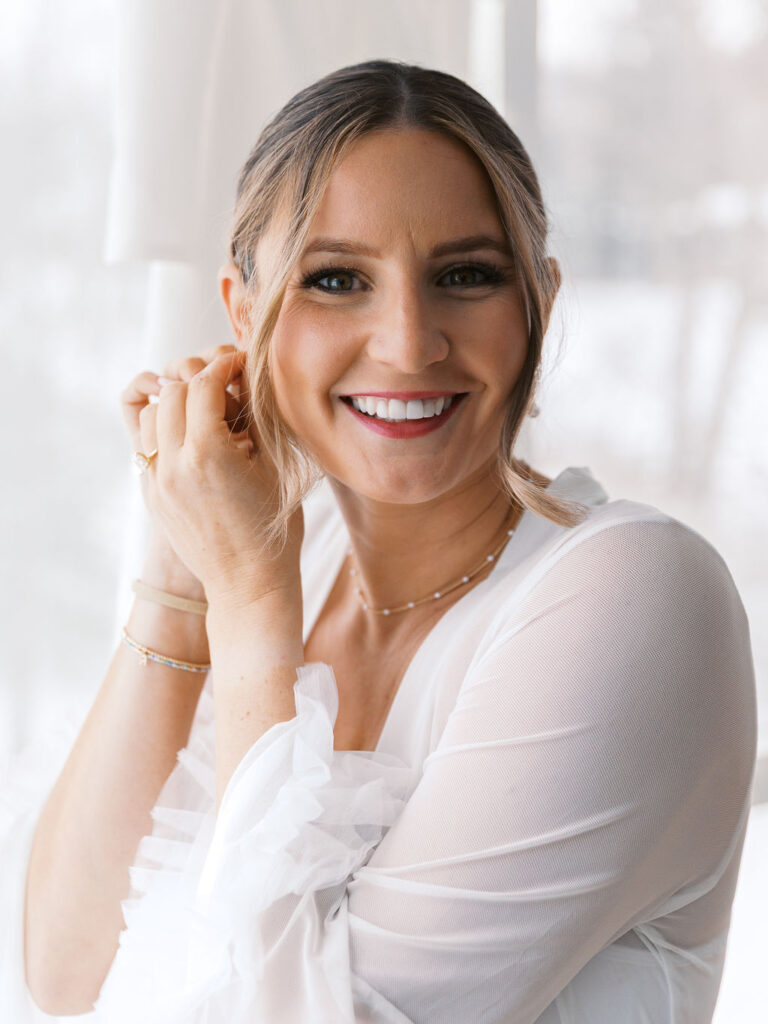 bride getting ready at Michigan Micro-wedding on film in falling snow, Fennville MI