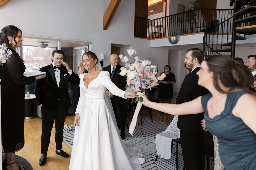 ceremony Michigan Micro-wedding on film in falling snow, Fennville MI