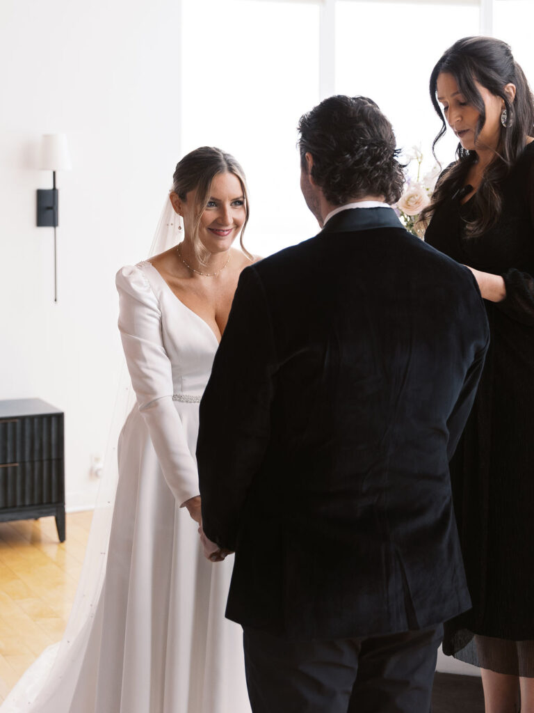 emotional ceremony Michigan Micro-wedding on film in falling snow, Fennville MI