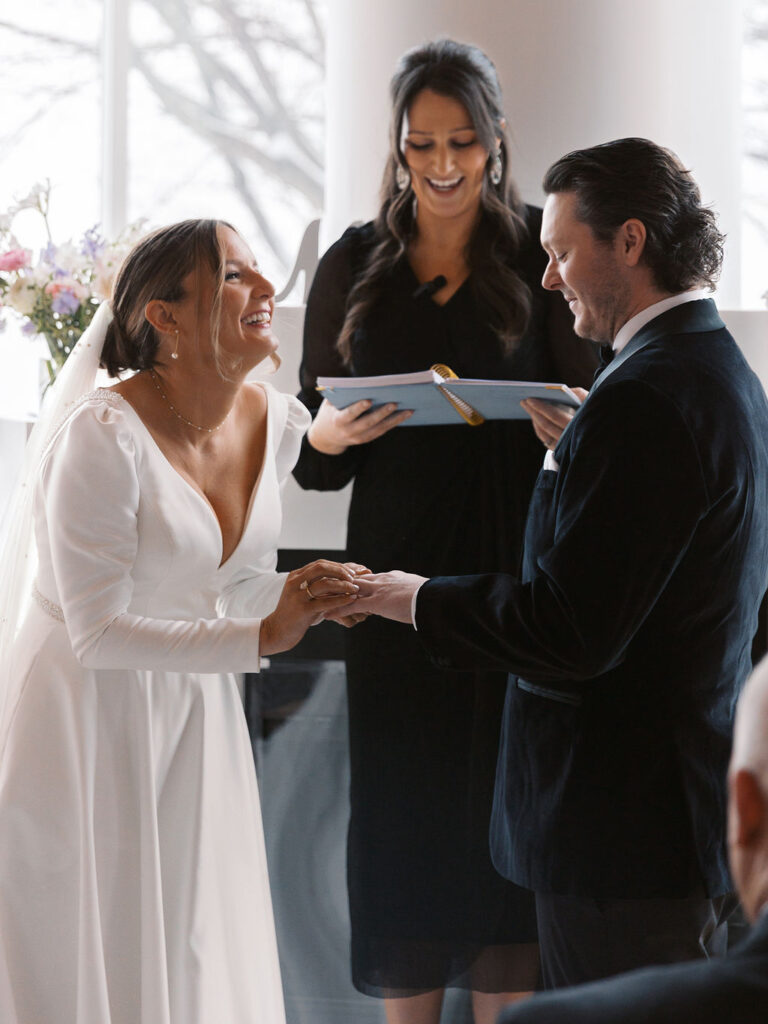 joyful ceremony Michigan Micro-wedding on film in falling snow, Fennville MI