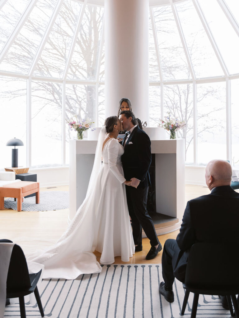 emotional ceremony Michigan Micro-wedding on film in falling snow, Fennville MI