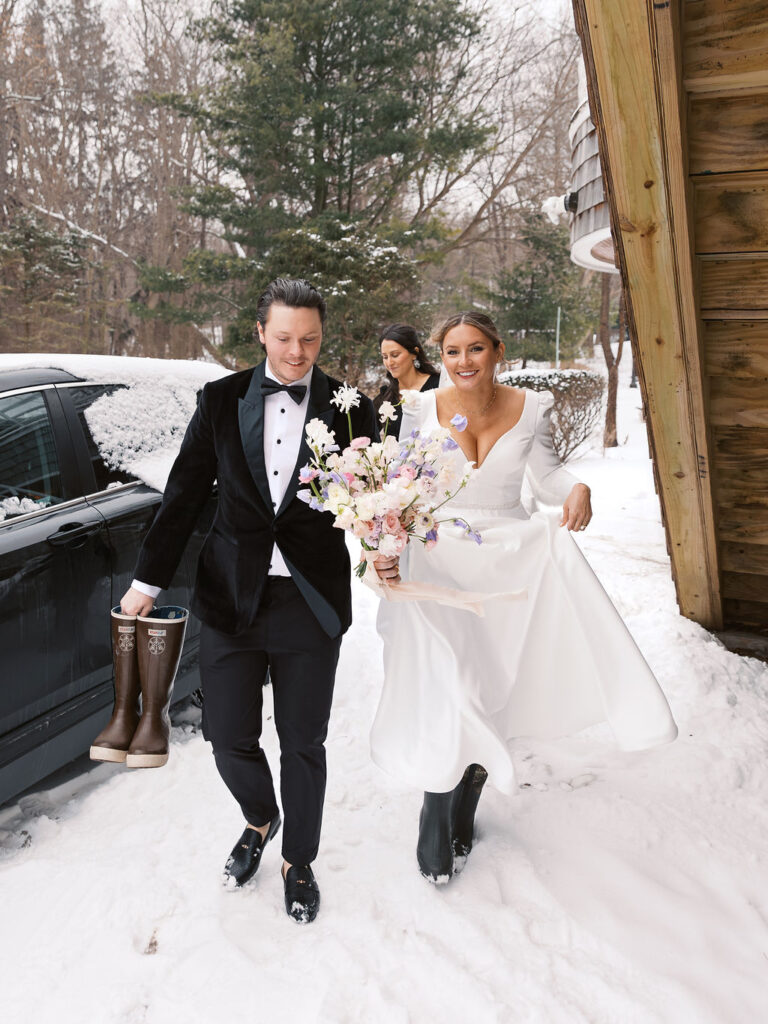 Winter portrait of couple bundled together in soft light on 35mm film