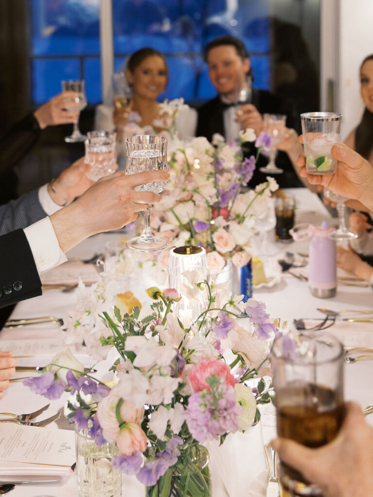 Final snowy portrait outside holding hands, winter micro-wedding film shot
