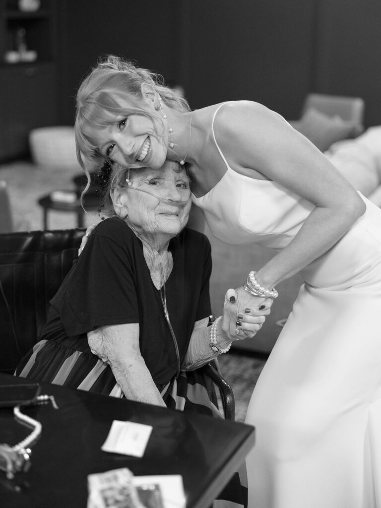 wedding the Grand Rapids Art Museum with clean architectural lines in the background on 35mm film