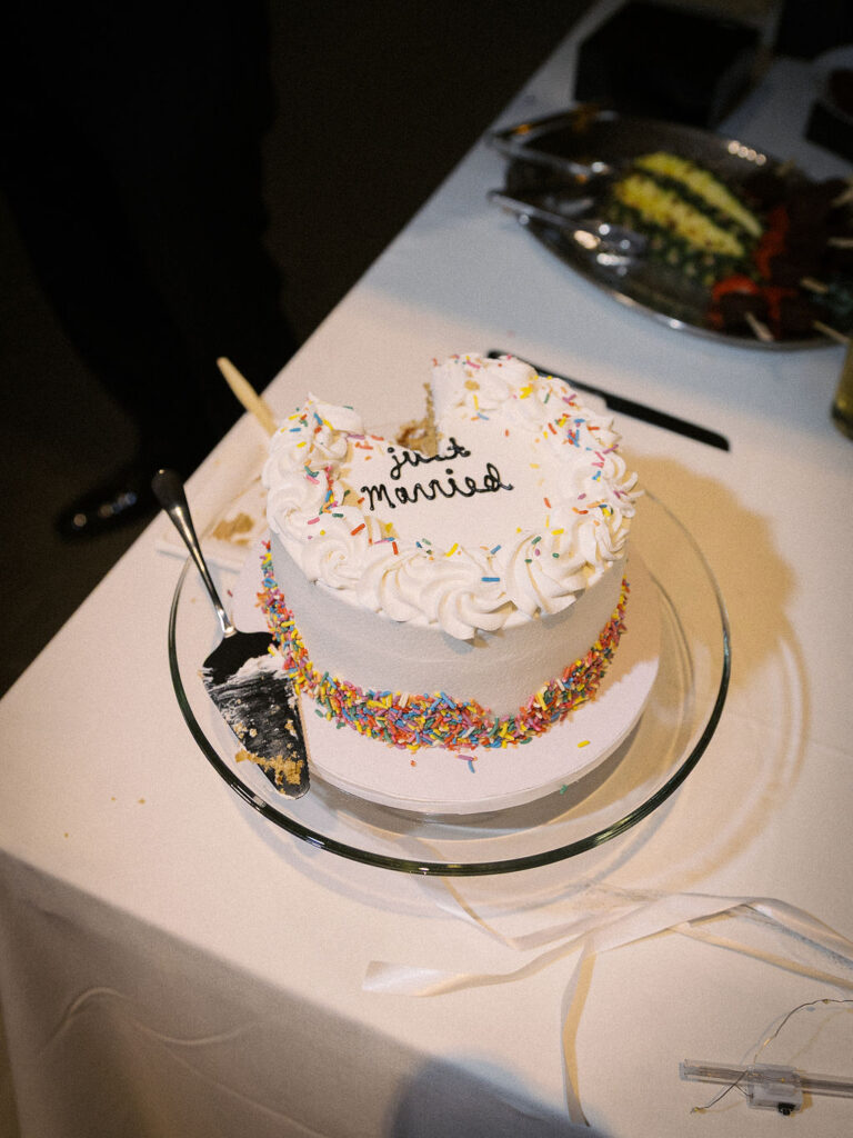 wedding the Grand Rapids Art Museum with clean architectural lines in the background on 35mm film
