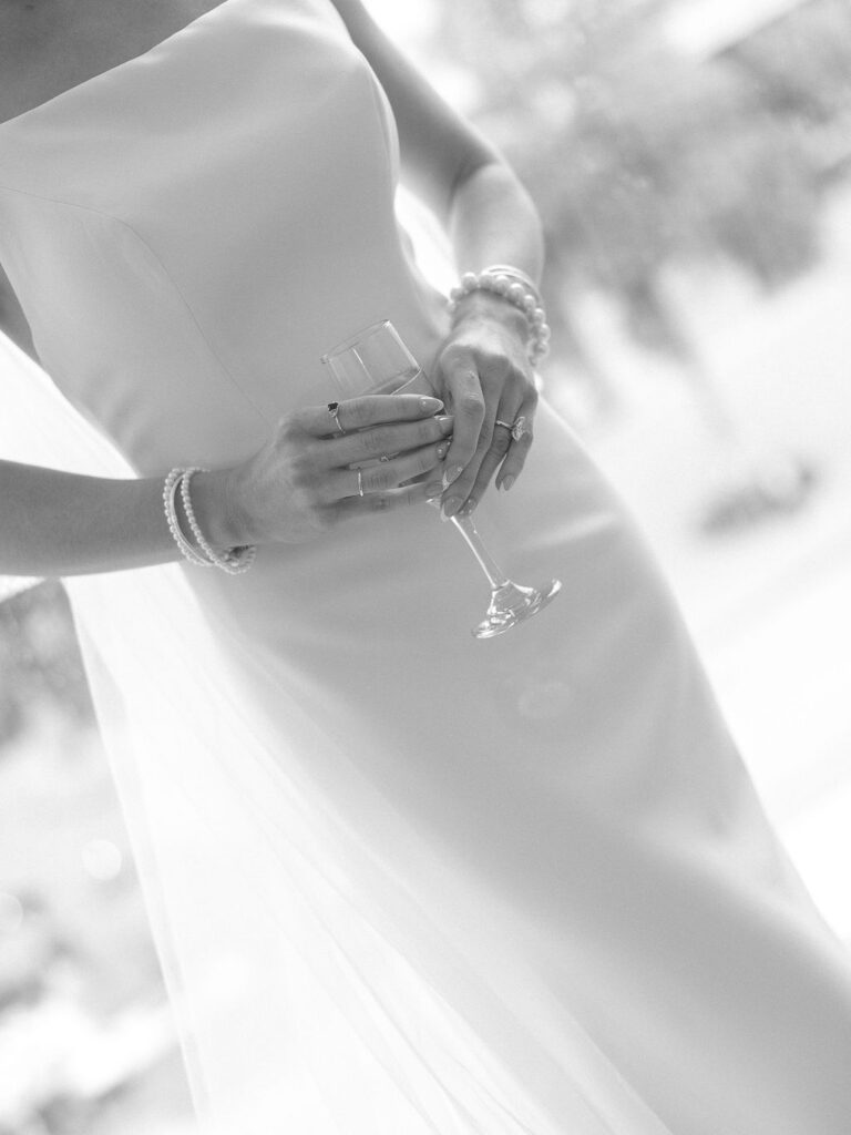 Elevated wedding party portrait in front of the Grand Rapids Art Museum steps