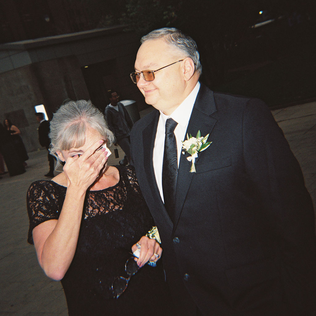 wedding the Grand Rapids Art Museum with clean architectural lines in the background on 35mm film