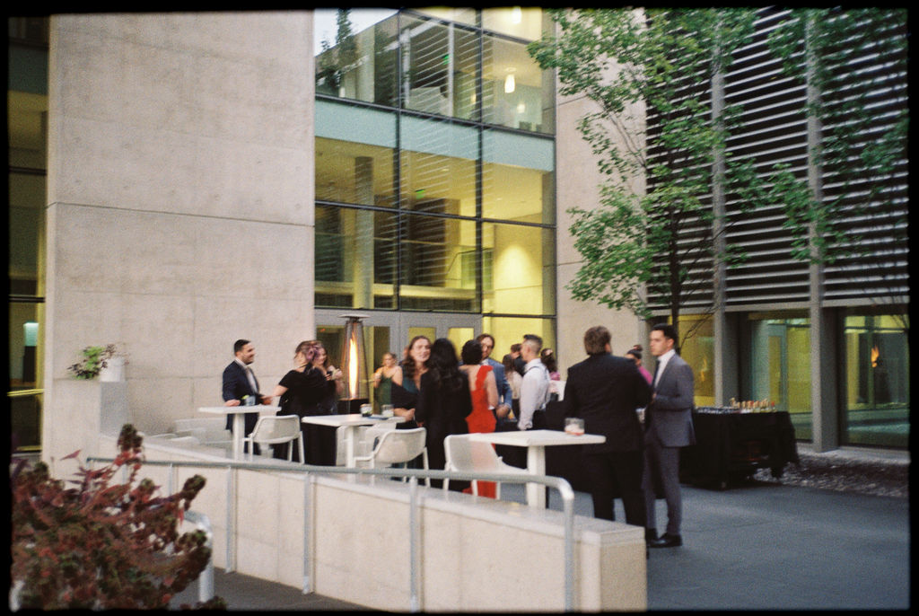 wedding the Grand Rapids Art Museum with clean architectural lines in the background on 35mm film