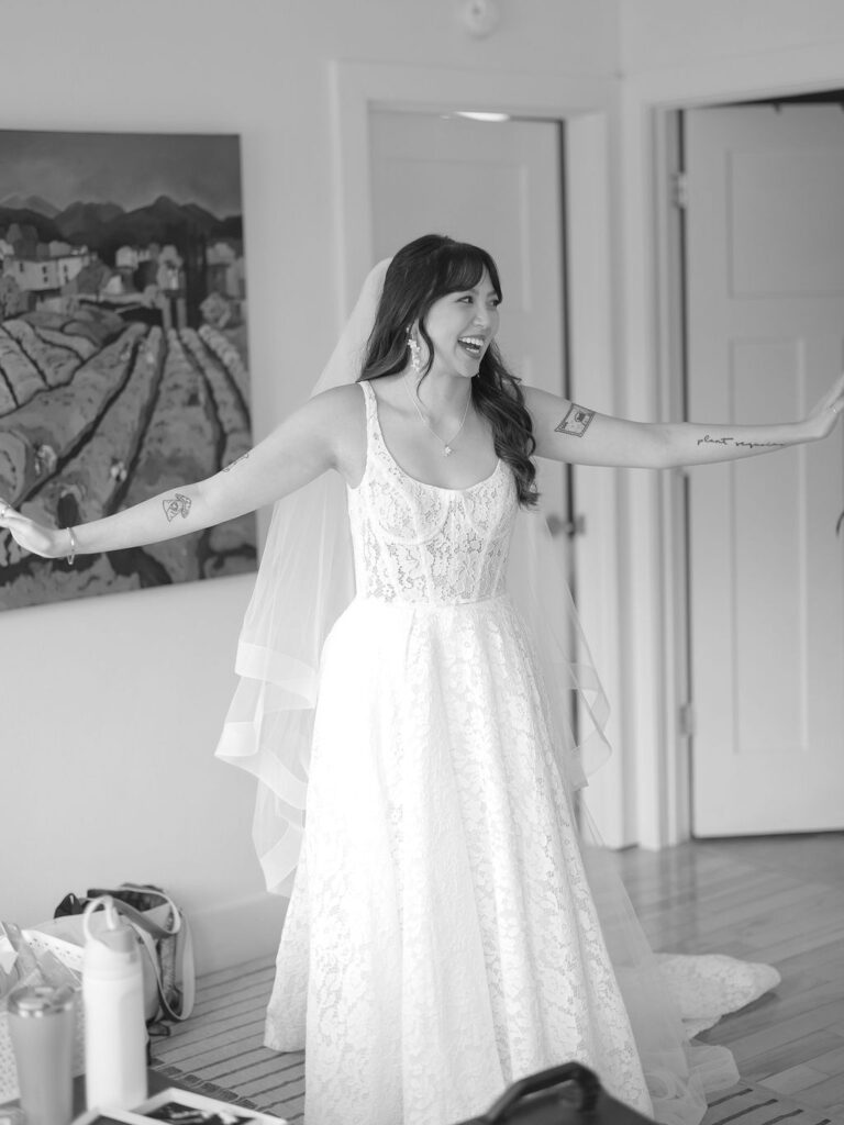 Of the Land Wedding Photos in Michigan on film, joyful celebration with lush florals and bride and groom laughing