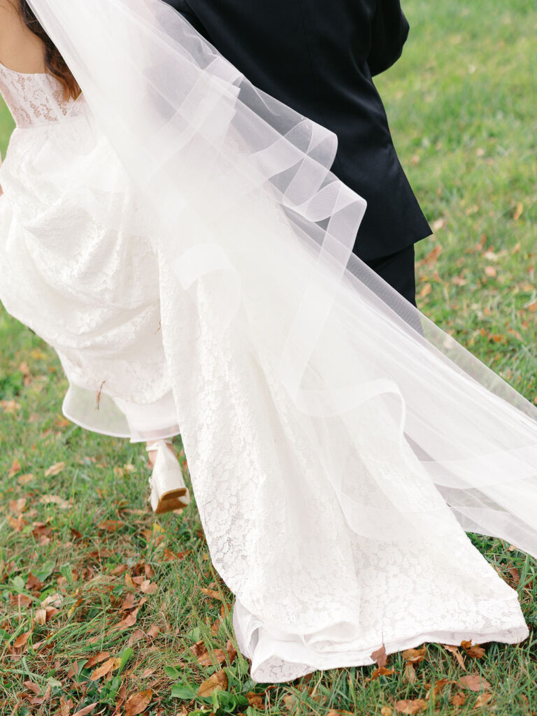 Of the Land Wedding Photos in Michigan on film, joyful celebration with lush florals and bride and groom laughing