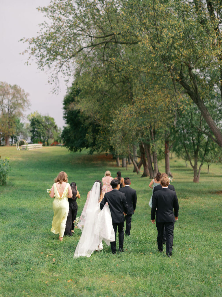 Of the Land Wedding Photos in Michigan on film, joyful celebration with lush florals and bride and groom laughing