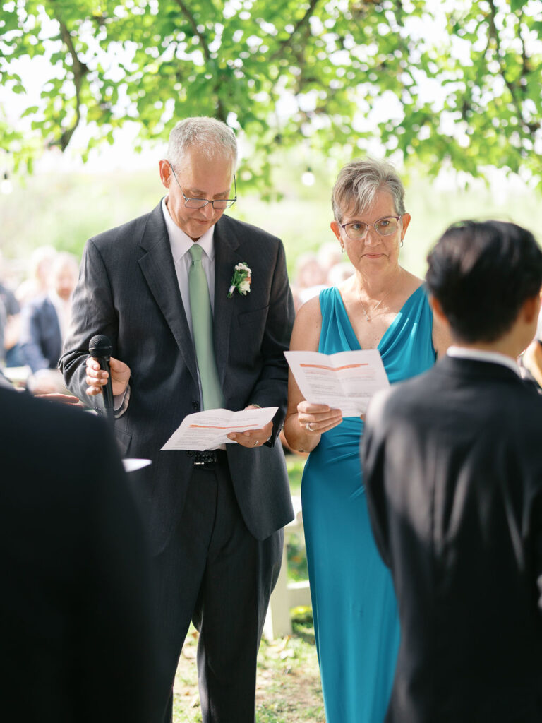 Of the Land Wedding Photos in Michigan on film, joyful celebration with lush florals and bride and groom laughing