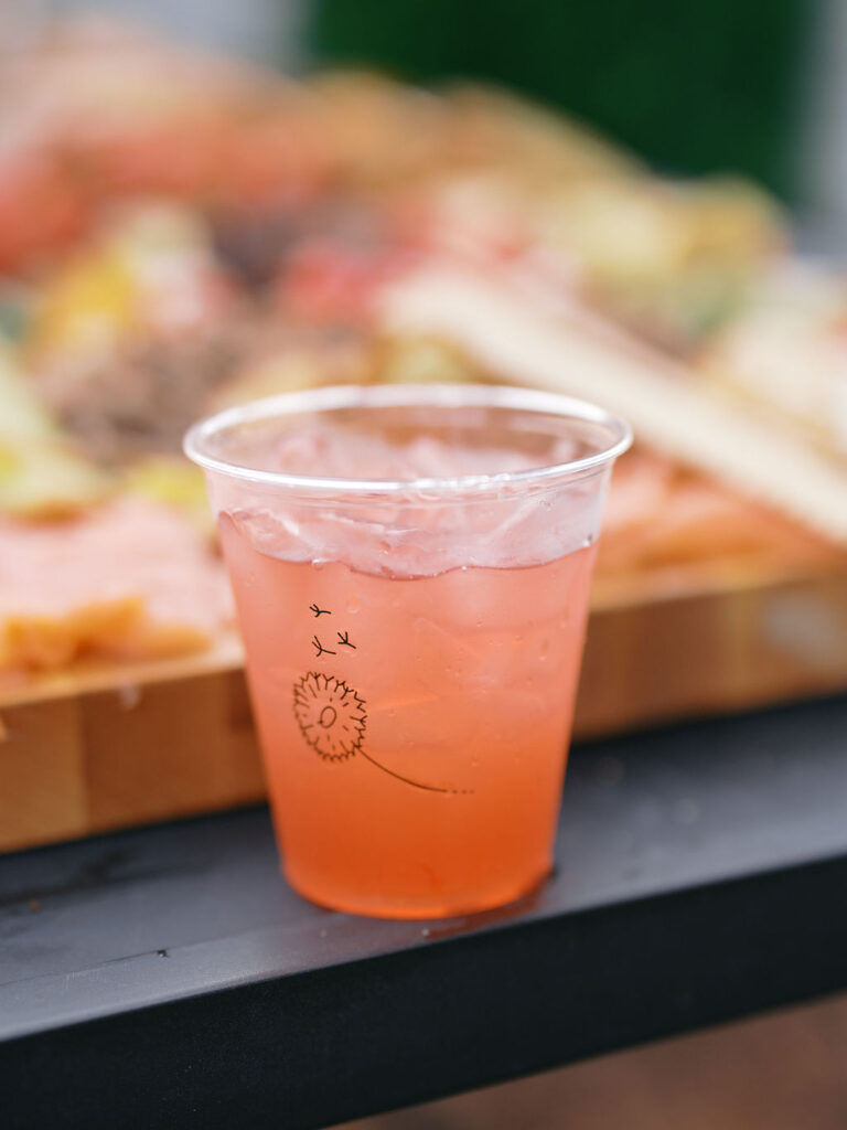 Of the Land Wedding Photos in Michigan on film, joyful celebration with lush florals and bride and groom laughing