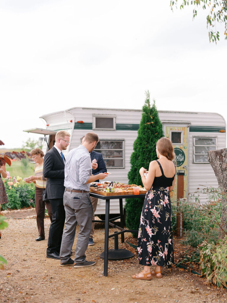 Of the Land Wedding Photos in Michigan on film, joyful celebration with lush florals and bride and groom laughing