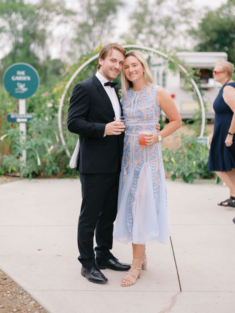 Of the Land Wedding Photos in Michigan on film, joyful celebration with lush florals and bride and groom laughing