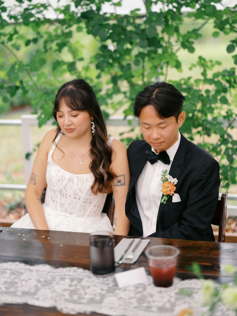 Of the Land Wedding Photos in Michigan on film, joyful celebration with lush florals and bride and groom laughing