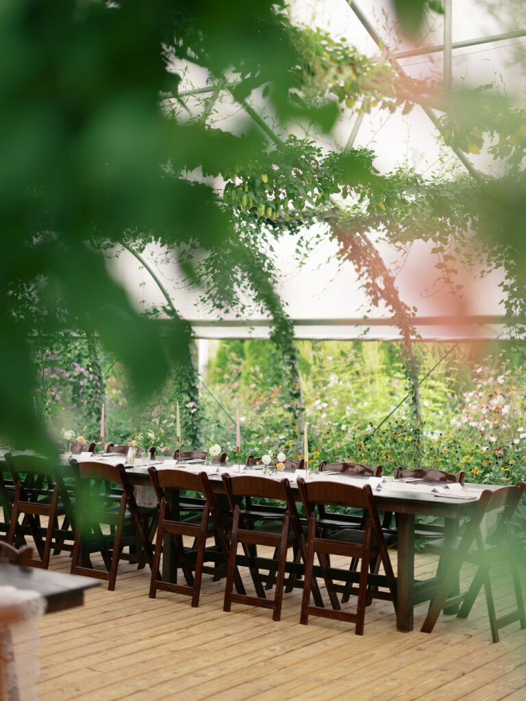 Of the Land Wedding Photos in Michigan on film, joyful celebration with lush florals and bride and groom laughing