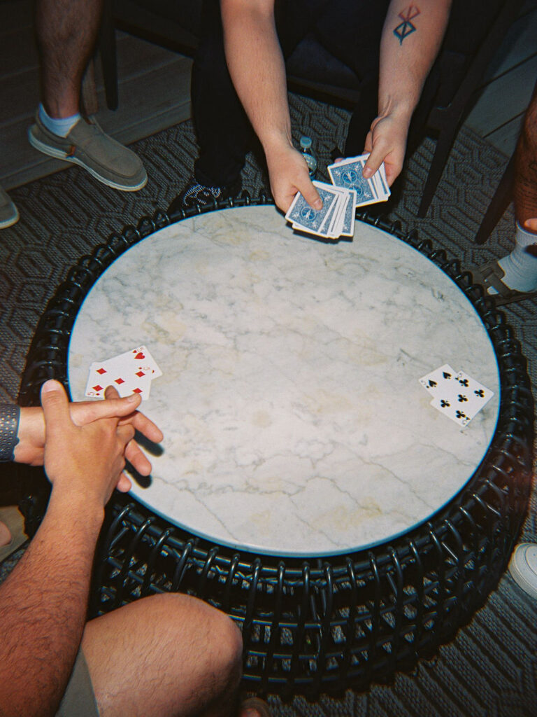 Reception tablescape with elegant florals and accented greenery at Port 393