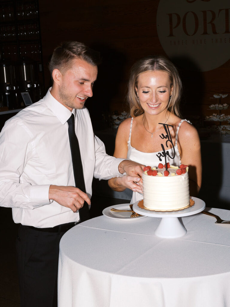 Reception tablescape with elegant florals and accented greenery at Port 393