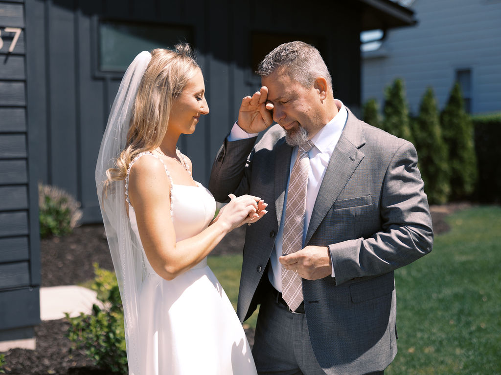 Emotional moment during church wedding ceremony in Holland MI