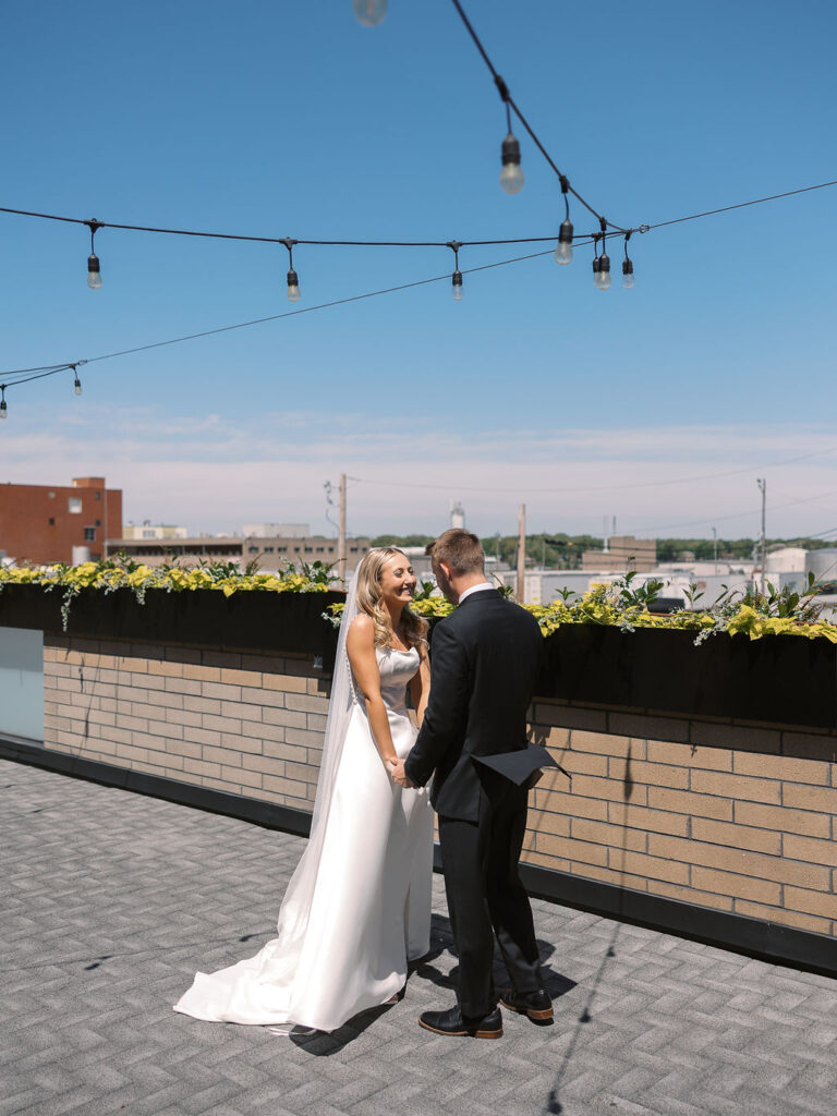Bride and groom smiling in the sunshine outside Port 393 on 35mm film