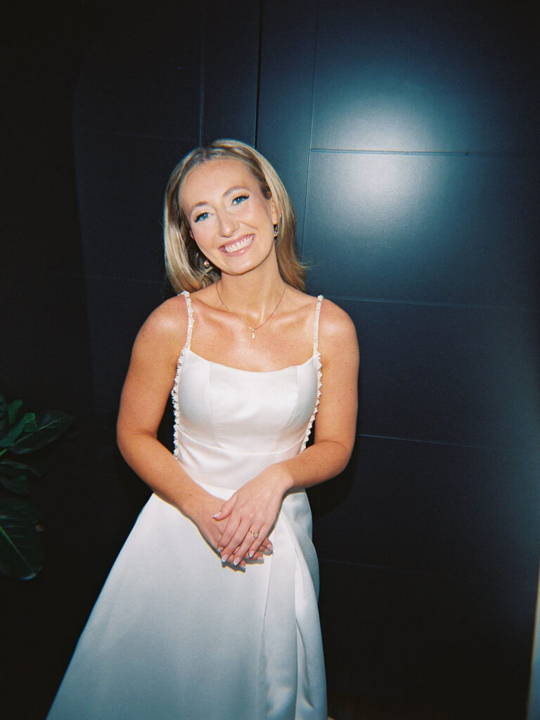 Reception tablescape with elegant florals and accented greenery at Port 393