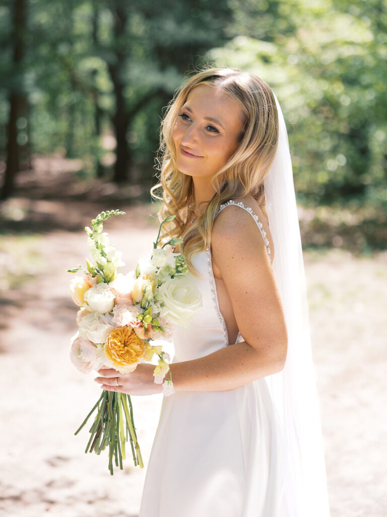 Bride and groom smiling in the sunshine outside Port 393 on 35mm film