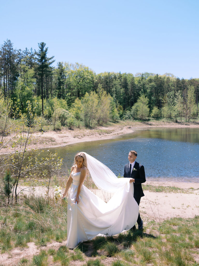 Bride and groom smiling in the sunshine outside Port 393 on 35mm film