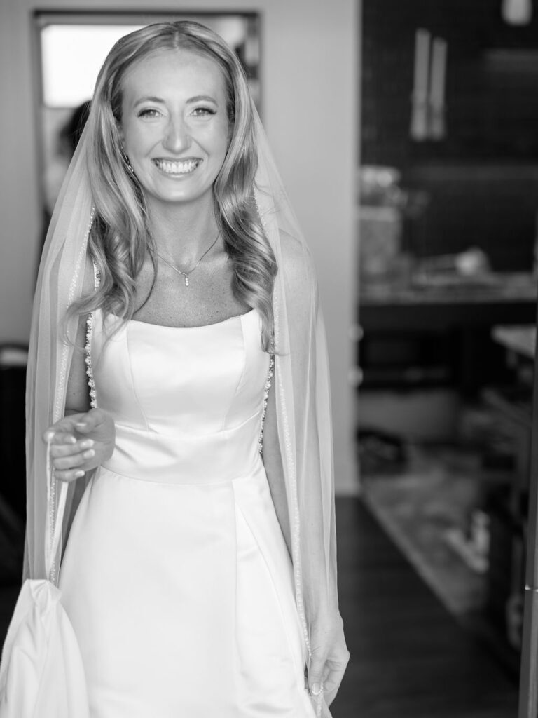 Bride and groom smiling in the sunshine outside Port 393 on 35mm film