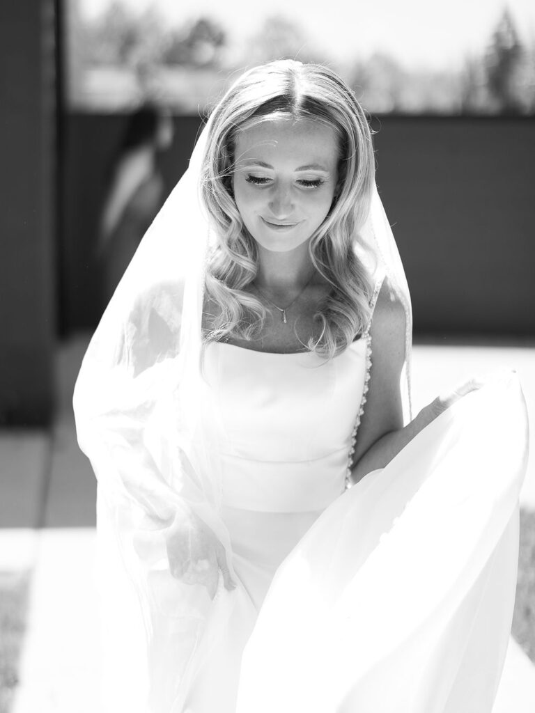 Bride and groom smiling in the sunshine outside Port 393 on 35mm film