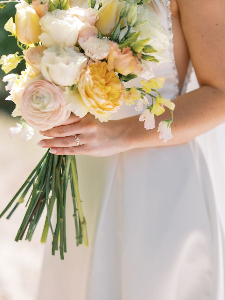 Bride and groom smiling in the sunshine outside Port 393 on 35mm film