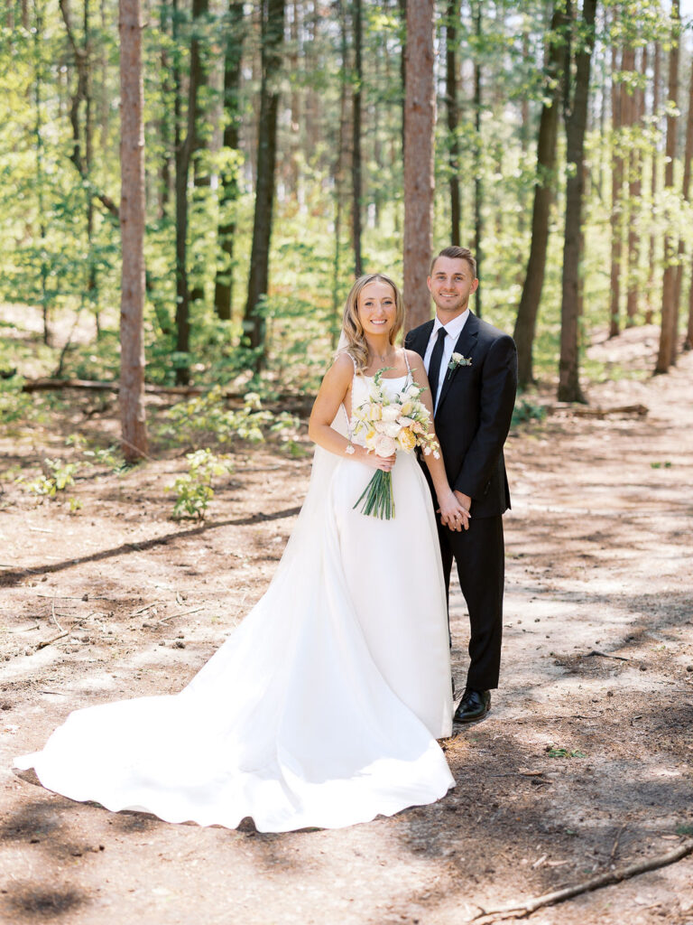 Bride and groom smiling in the sunshine outside Port 393 on 35mm film