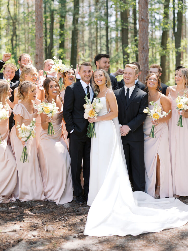Bride and groom smiling in the sunshine outside Port 393 on 35mm film