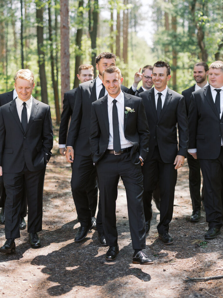 Bride and groom smiling in the sunshine outside Port 393 on 35mm film