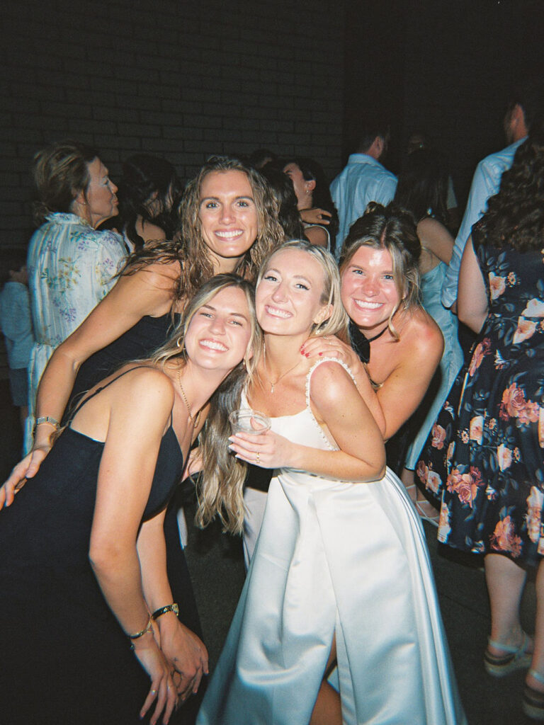 Reception tablescape with elegant florals and accented greenery at Port 393