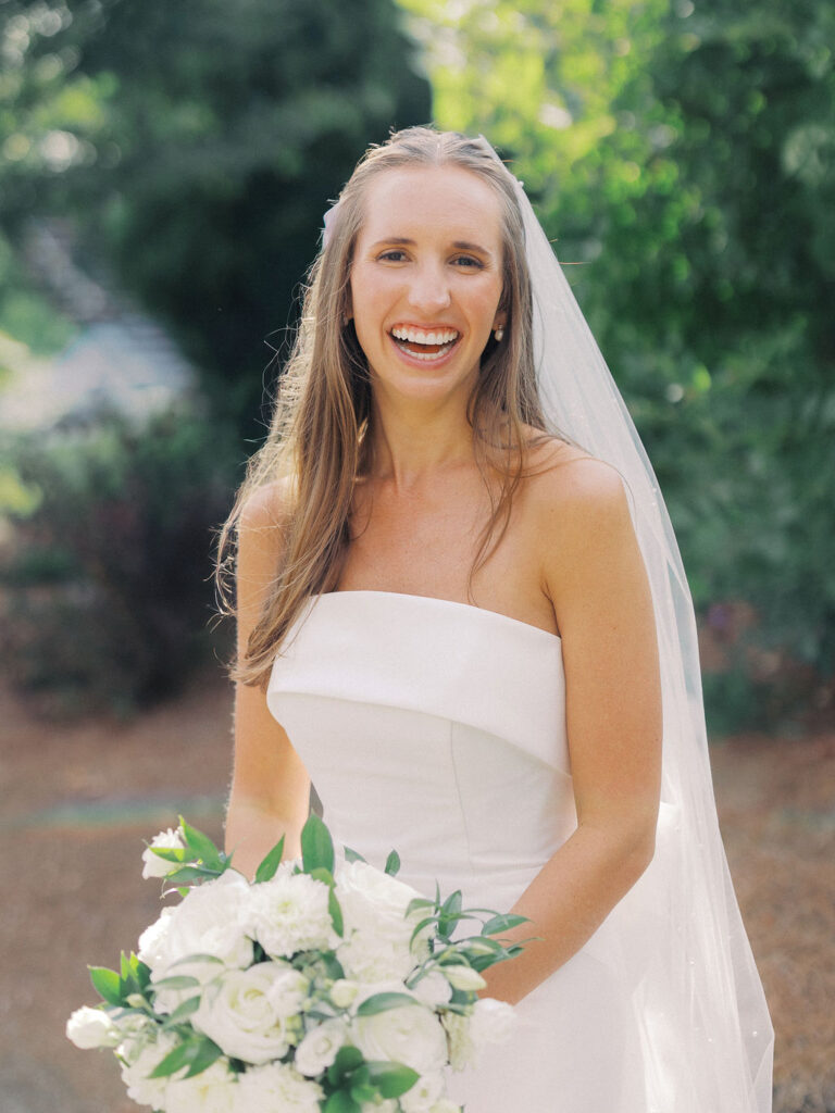 bride and groom portrait at The Union Pavilion at Railside with soft romantic florals and greenery on film