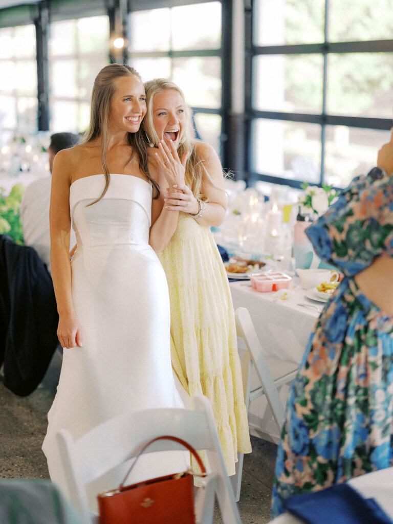 Bride smiling with bridesmaids in soft pastel dresses, Nancy Meyers–inspired styling