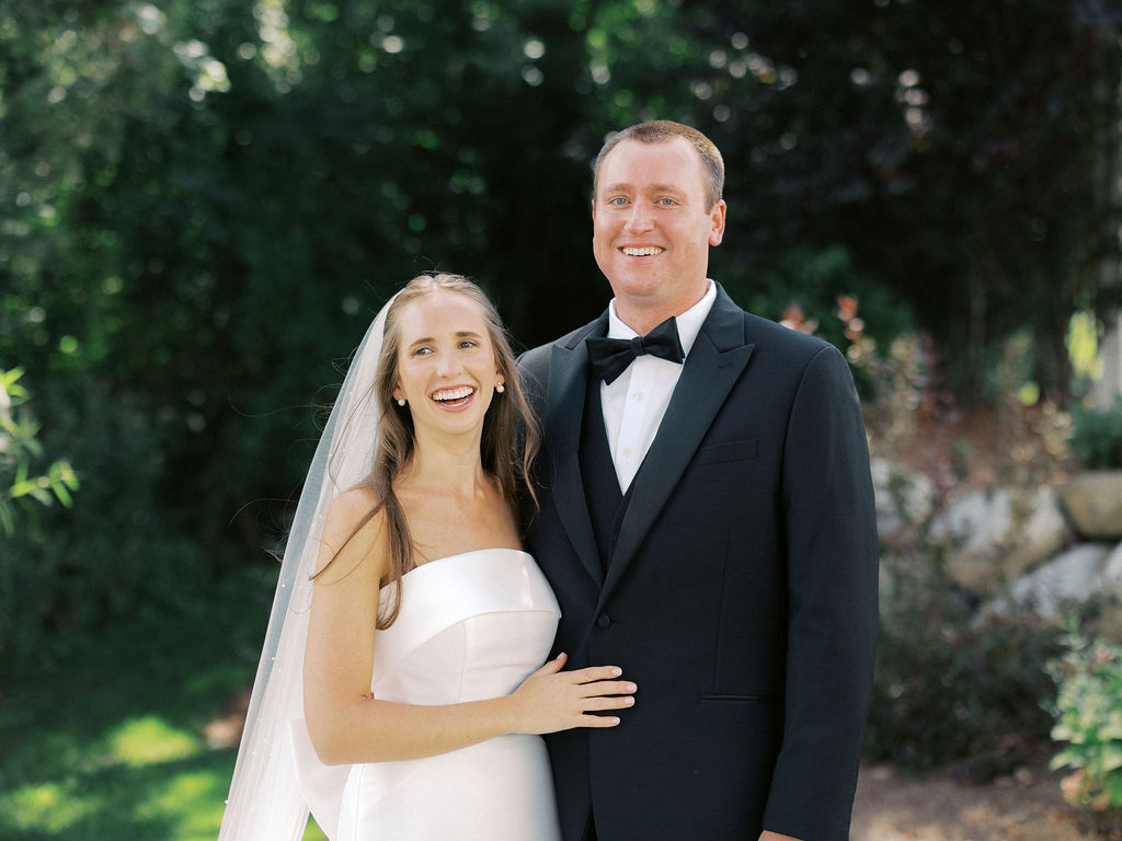 bride and groom portrait at The Union Pavilion at Railside with soft romantic florals and greenery on film