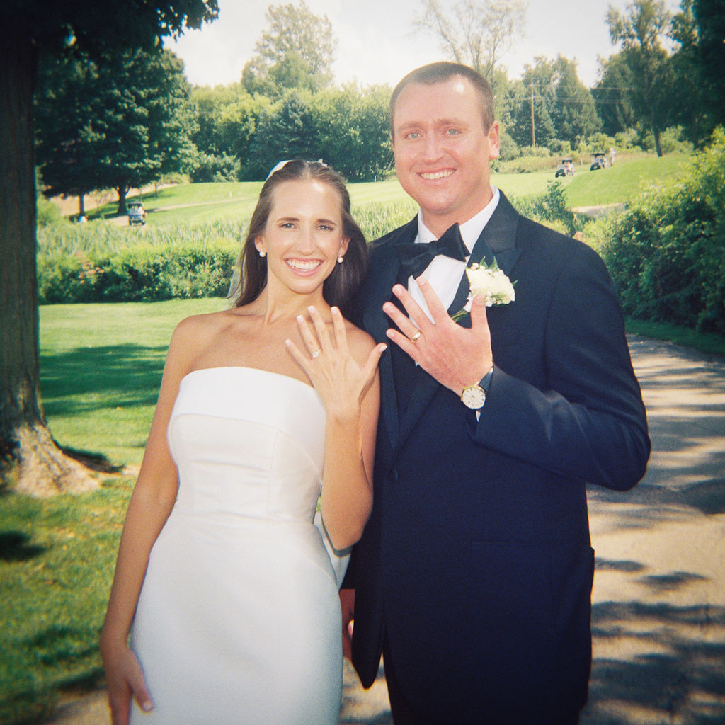 Outdoor ceremony at The Union Pavilion at Railside with soft romantic florals and greenery