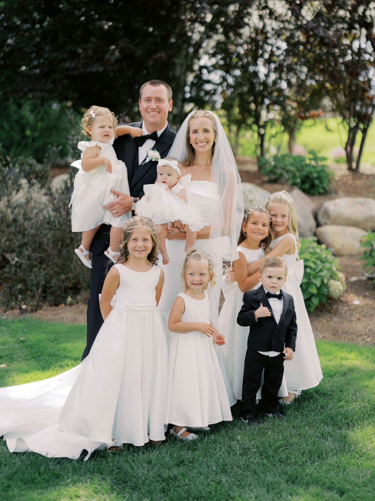 bride and groom portrait at The Union Pavilion at Railside with soft romantic florals and greenery on film