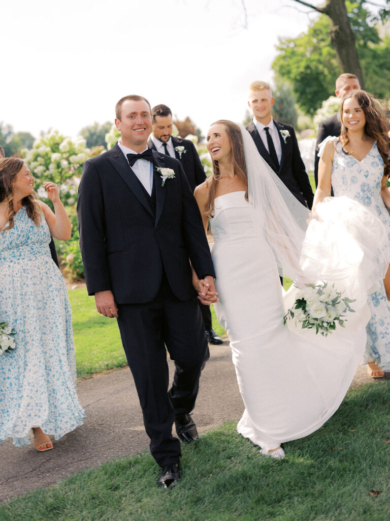 bride and groom portrait at The Union Pavilion at Railside with soft romantic florals and greenery on film