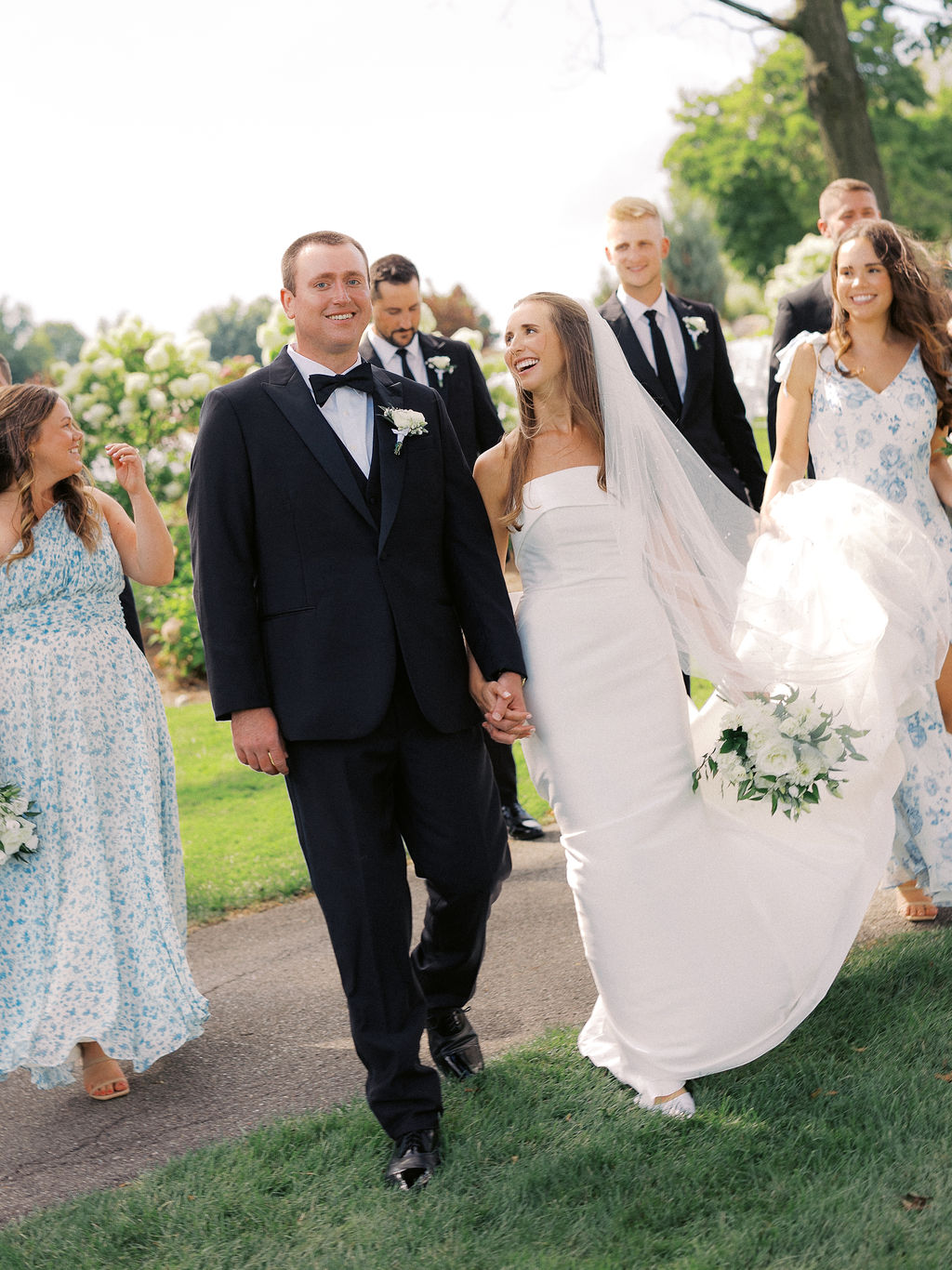 bride and groom portrait at The Union Pavilion at Railside with soft romantic florals and greenery on film