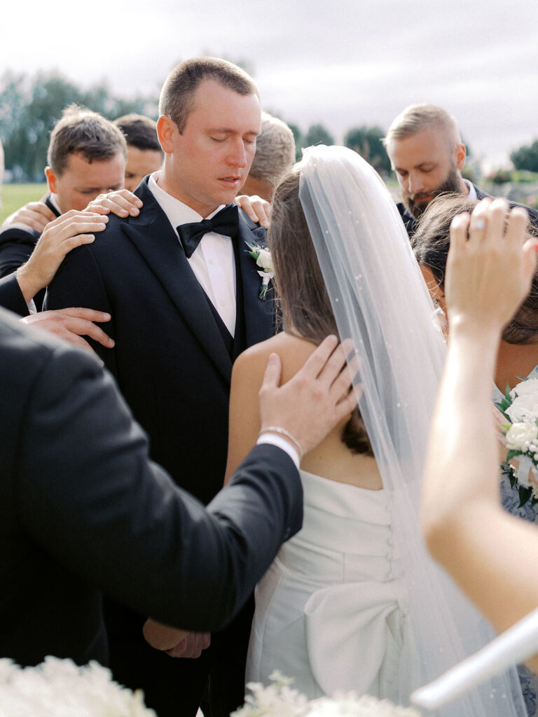 Outdoor ceremony at The Union Pavilion at Railside with soft romantic florals and greenery on film