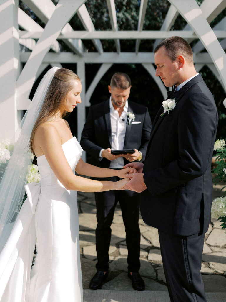 Outdoor ceremony at The Union Pavilion at Railside with soft romantic florals and greenery on film