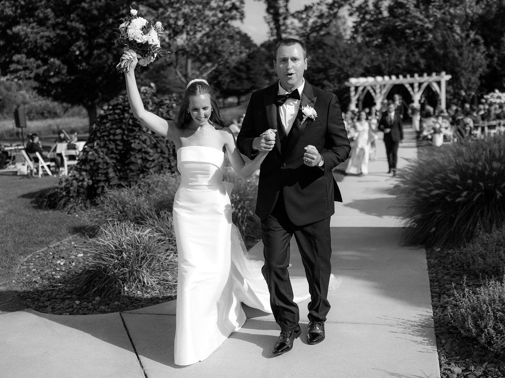 bride and groom portrait at The Union Pavilion at Railside with soft romantic florals and greenery on film