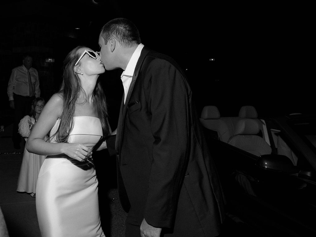 bride and groom portrait at The Union Pavilion at Railside with soft romantic florals and greenery on film