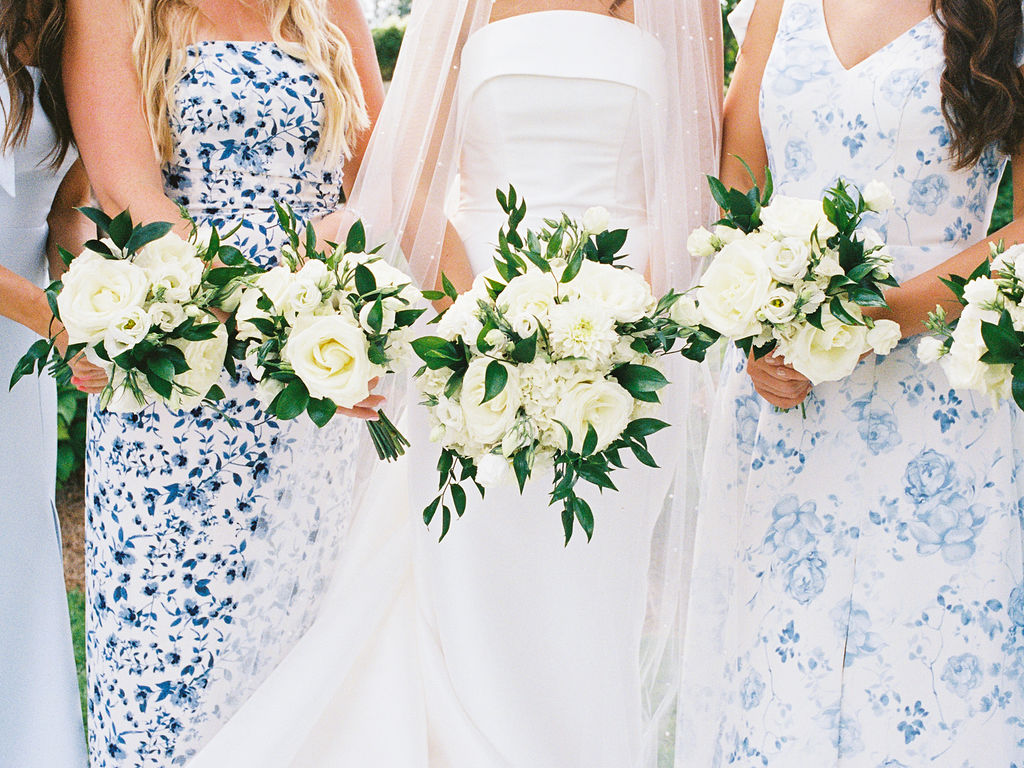 Outdoor ceremony at The Union Pavilion at Railside with soft romantic florals and greenery