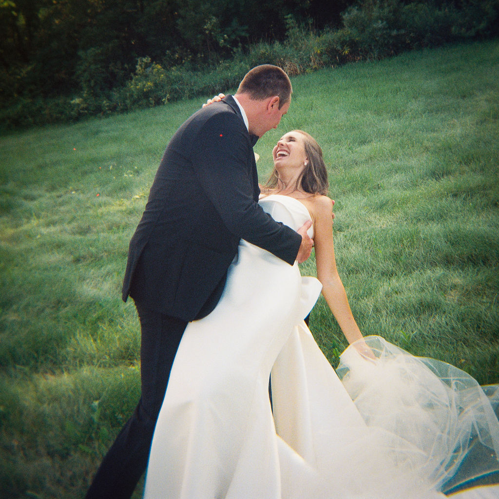 Outdoor ceremony at The Union Pavilion at Railside with soft romantic florals and greenery