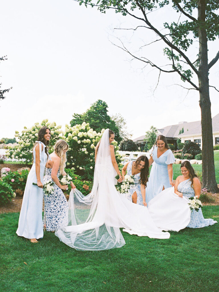 Outdoor ceremony at The Union Pavilion at Railside with soft romantic florals and greenery on film